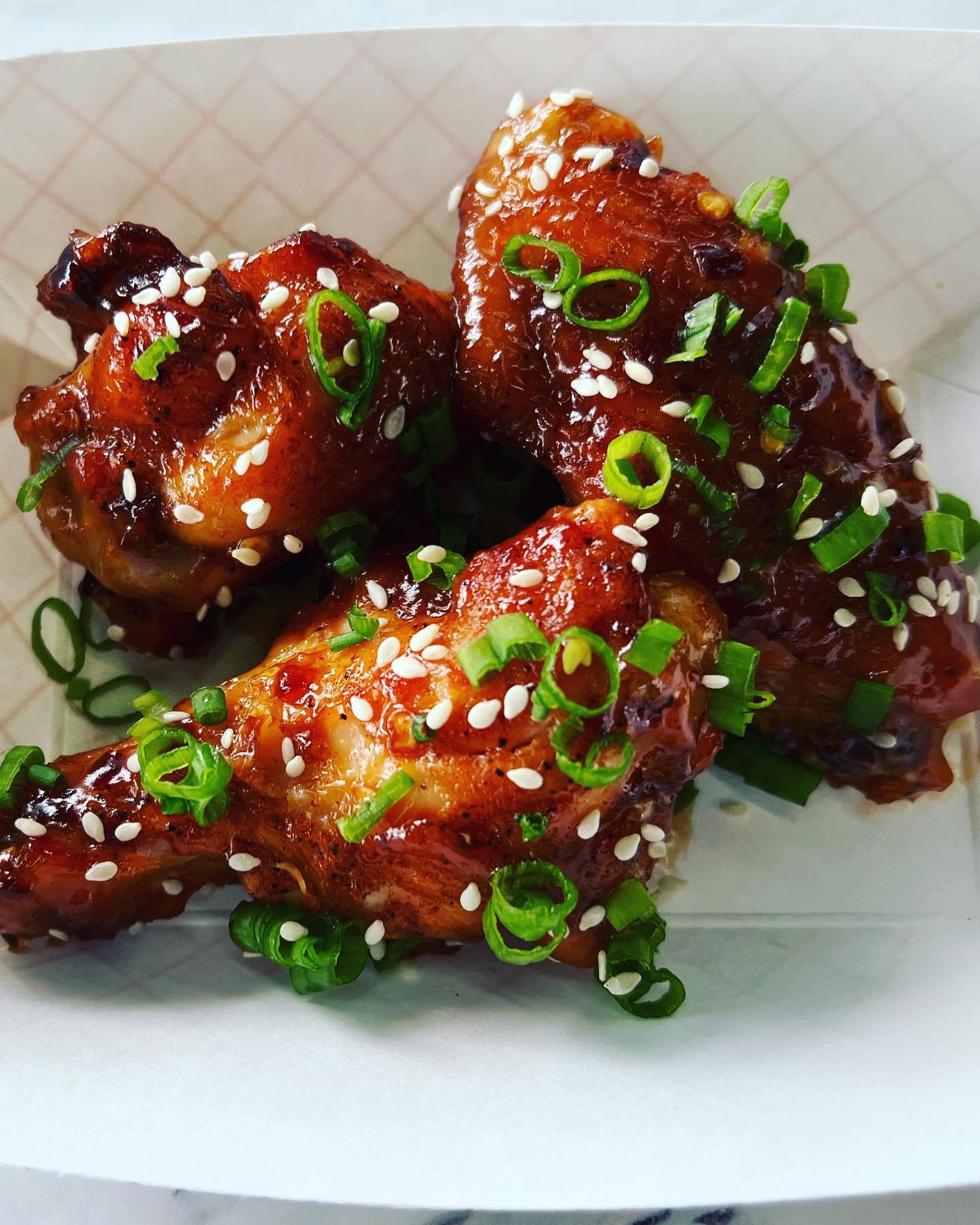Sticky glazed wings with sesame and scallion