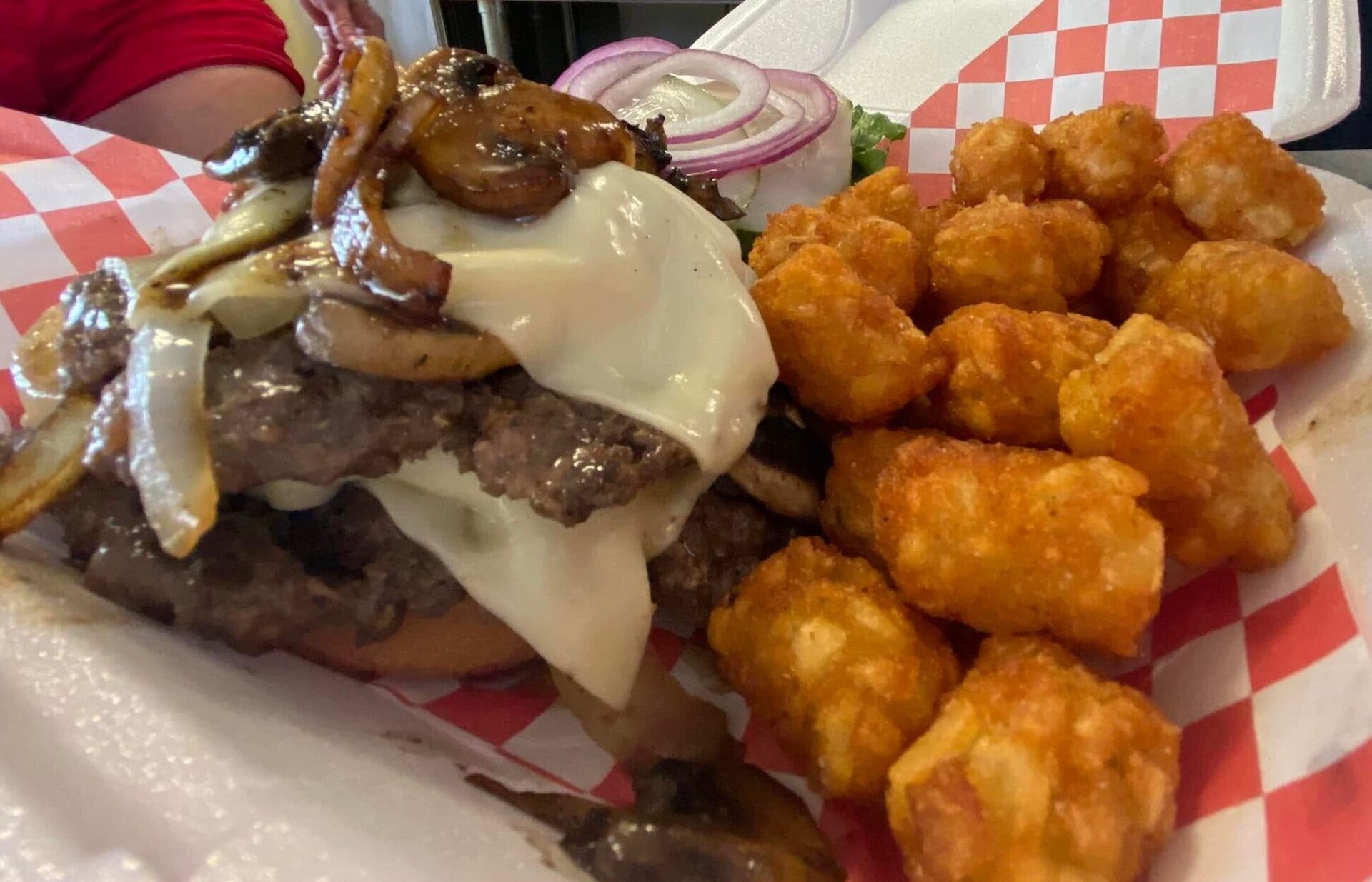 Mushroom Swiss smash burger with tots
