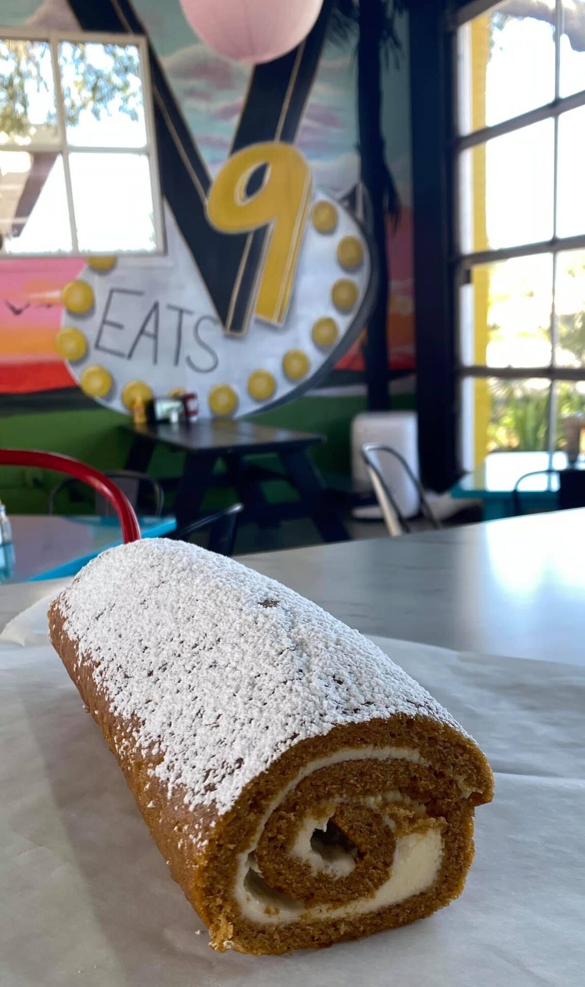 Pumpkin roll in front of the marquee sign