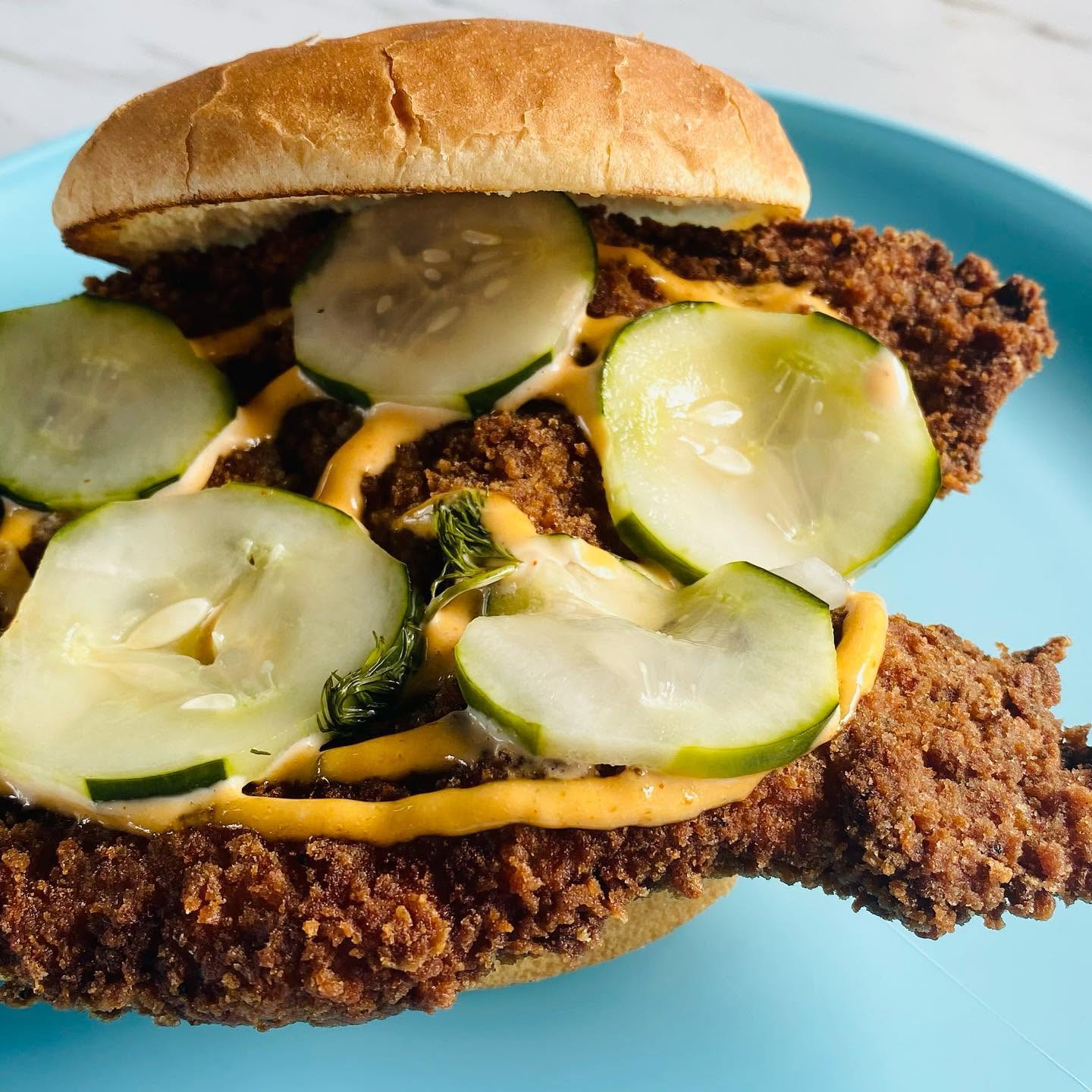 Fried schnitzel sandwich with house pickles